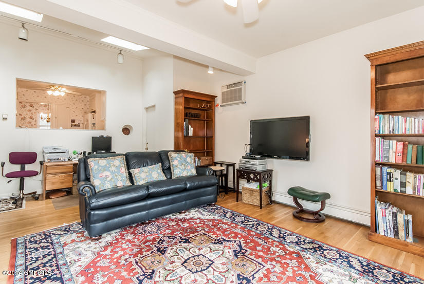 9 Linwood Avenue Riverside, CT 06878 - Photo 8 of 23 a living room with furniture and a flat screen tv