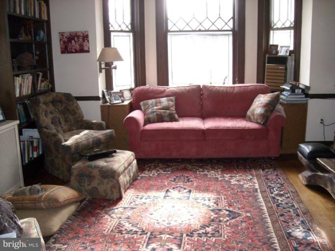 5504 Wexford Road Baltimore, MD 21209 - Photo 2 of 18 a living room with furniture and a window