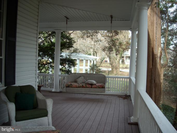 5504 Wexford Road Baltimore, MD 21209 - Photo 9 of 18 a view of a porch with furniture