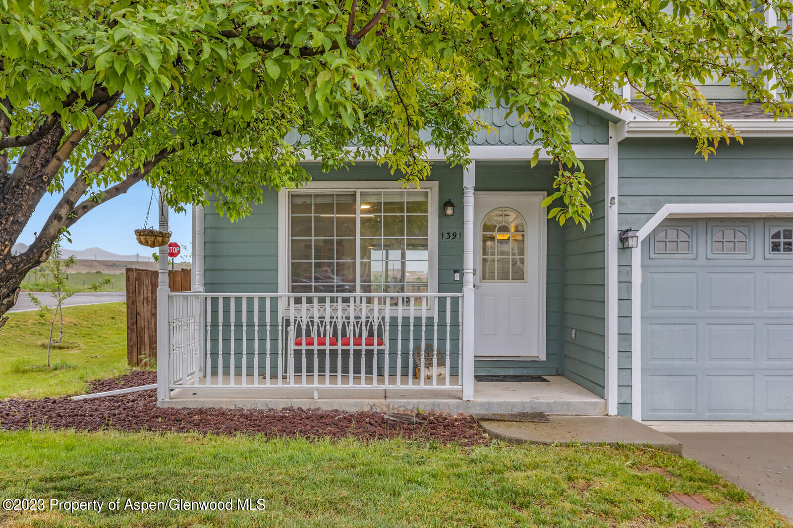1391 East 17th Street Rifle, CO 81650 - Photo 3 of 36 front view of a house with a yard