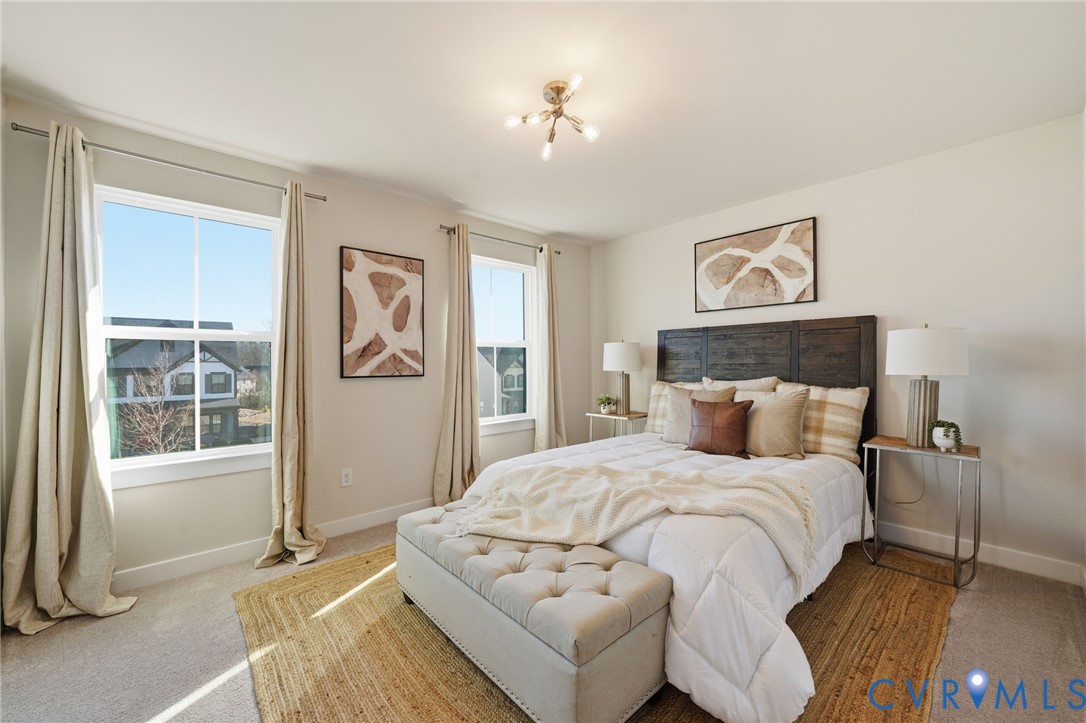 4730 Hepler Ridge Way Glen Allen, VA 23059 - Photo 18 of 39 a bedroom with a bed and a window