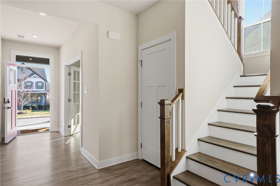 4730 Hepler Ridge Way Glen Allen, VA 23059 - Photo 2 of 39 a view of an entryway with wooden floor and windows