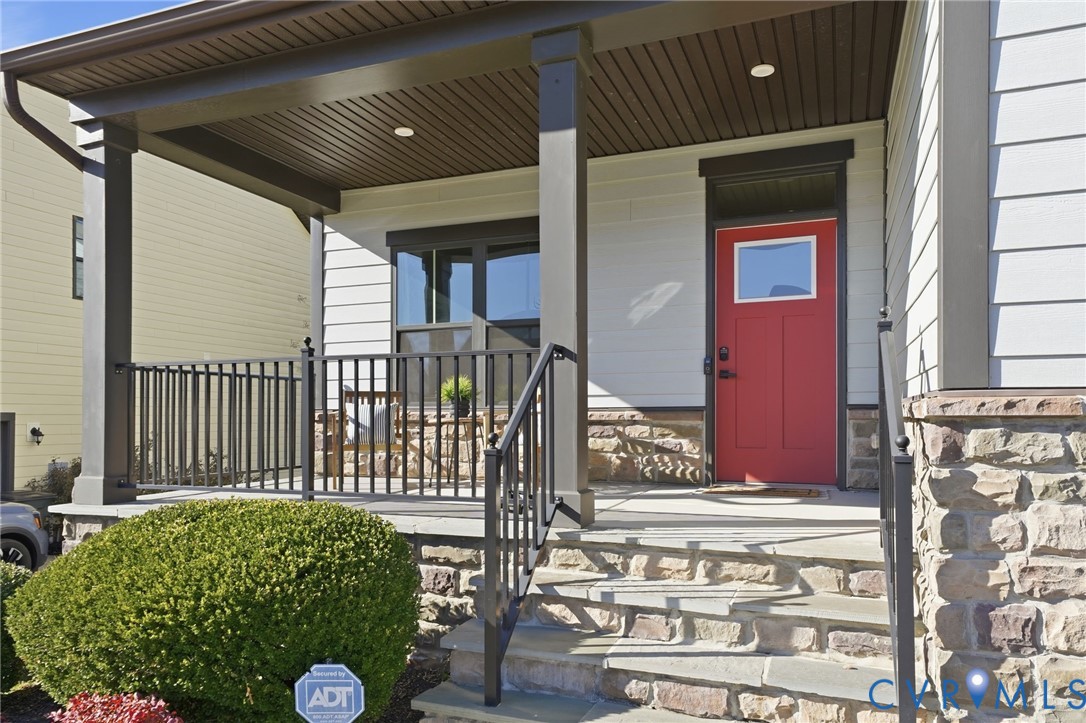 4730 Hepler Ridge Way Glen Allen, VA 23059 - Photo 38 of 39 a view of a house with a small yard and wooden fence