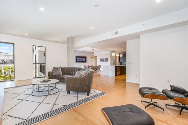 a living room with furniture and a table