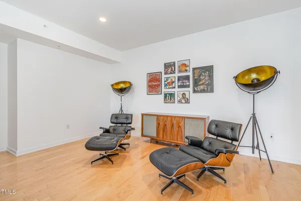 a room with furniture and gym equipment