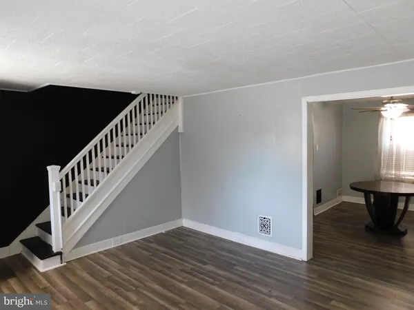 a view of entryway with wooden floor