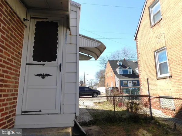 a view of a house with a street
