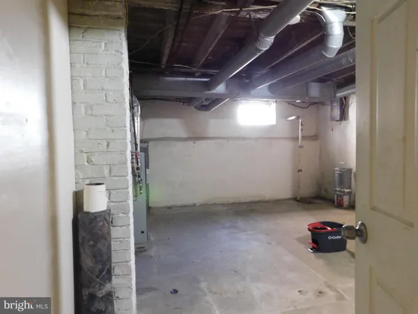 a bathroom with a toilet and a sink