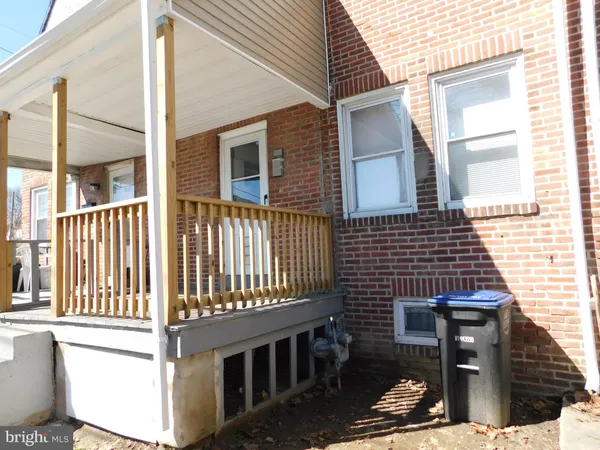 a view of a house with a street