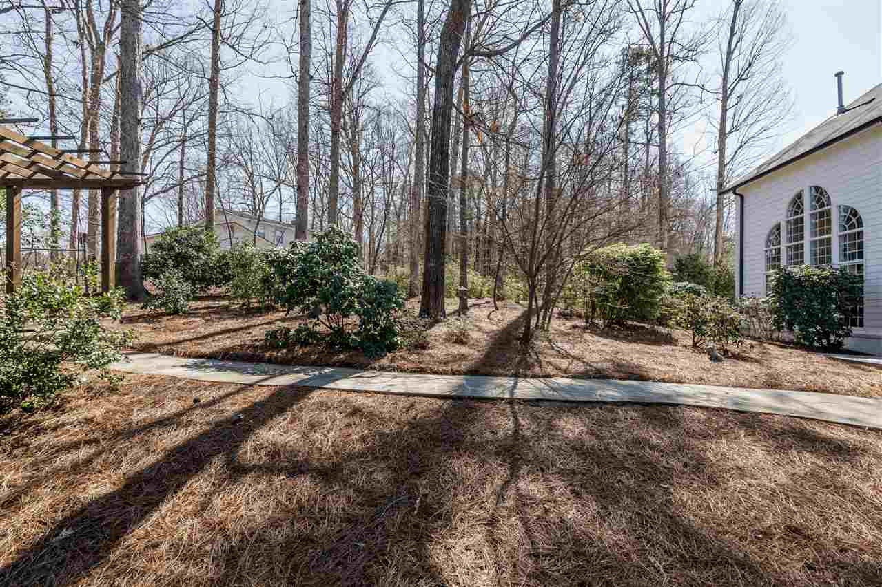 3916 Hemsbury Way Raleigh, NC 27612 - Photo 30 of 30 Professionally Landscaped Large Backyard
