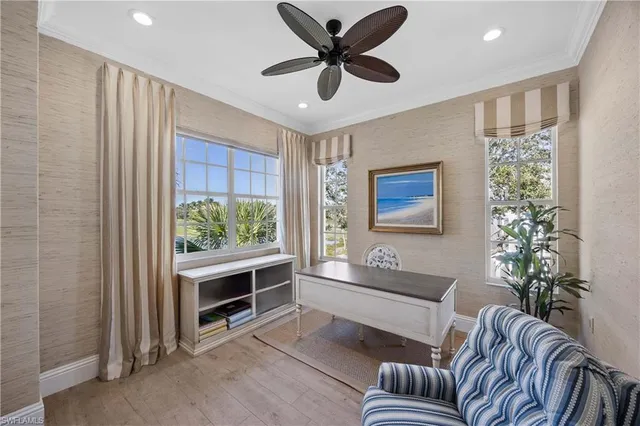 a bedroom with bed and a chandelier