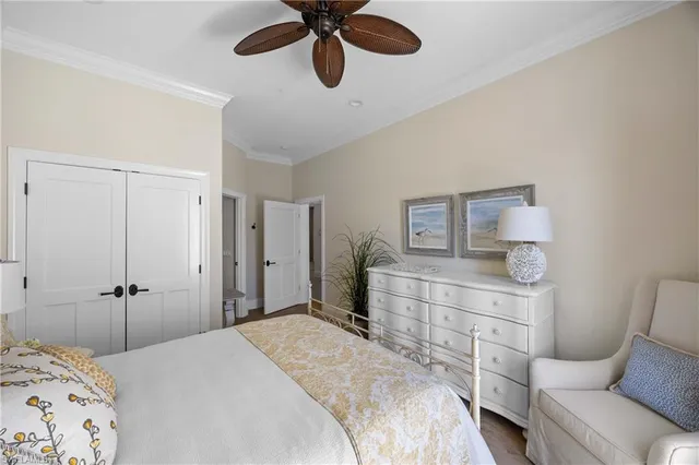 a dining room with furniture window and wooden floor