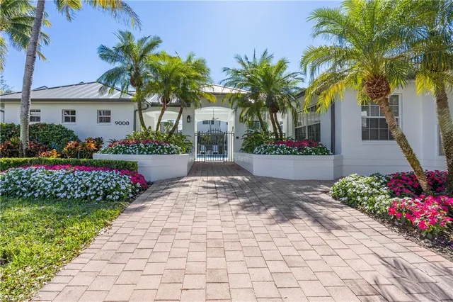 a view of a house with a swimming pool