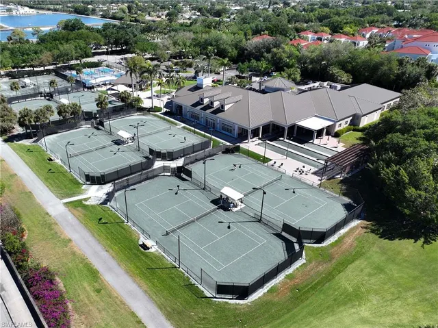 an aerial view of a house with a patio