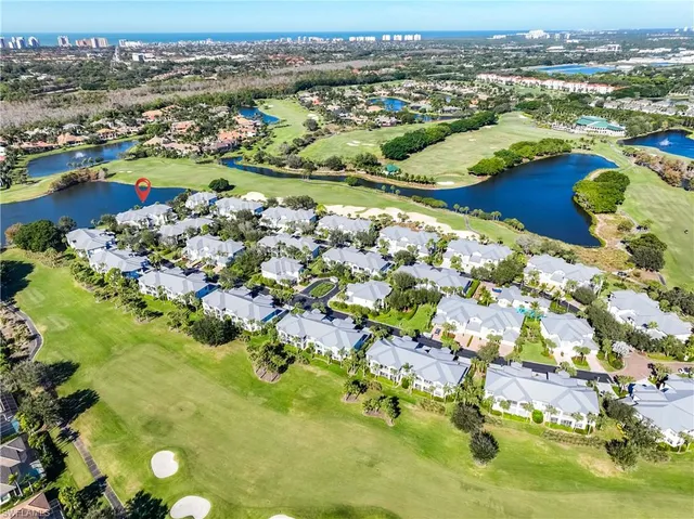 a view of lake and houses with outdoor space