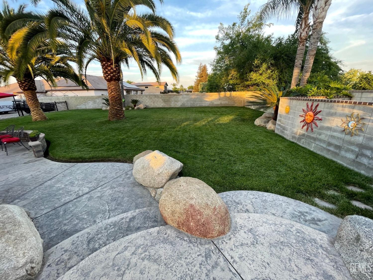 Undisclosed Address Bakersfield, CA 93314 - Photo 13 of 60 a view of a backyard