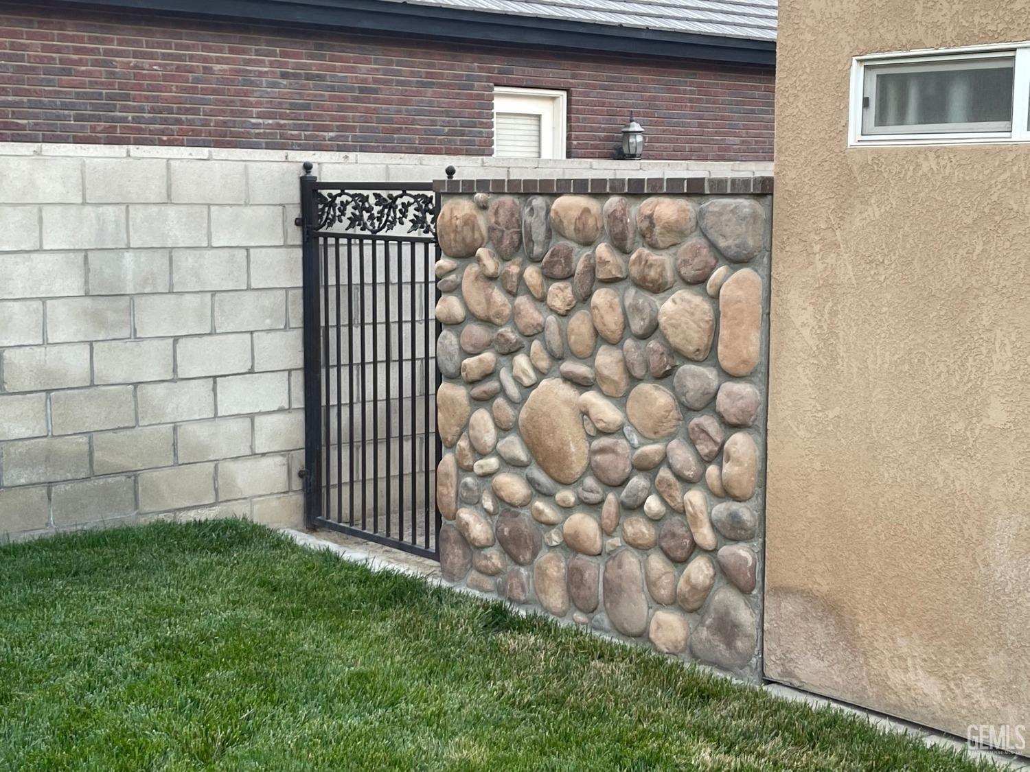 Undisclosed Address Bakersfield, CA 93314 - Photo 23 of 60 a view of a wooden door of a house