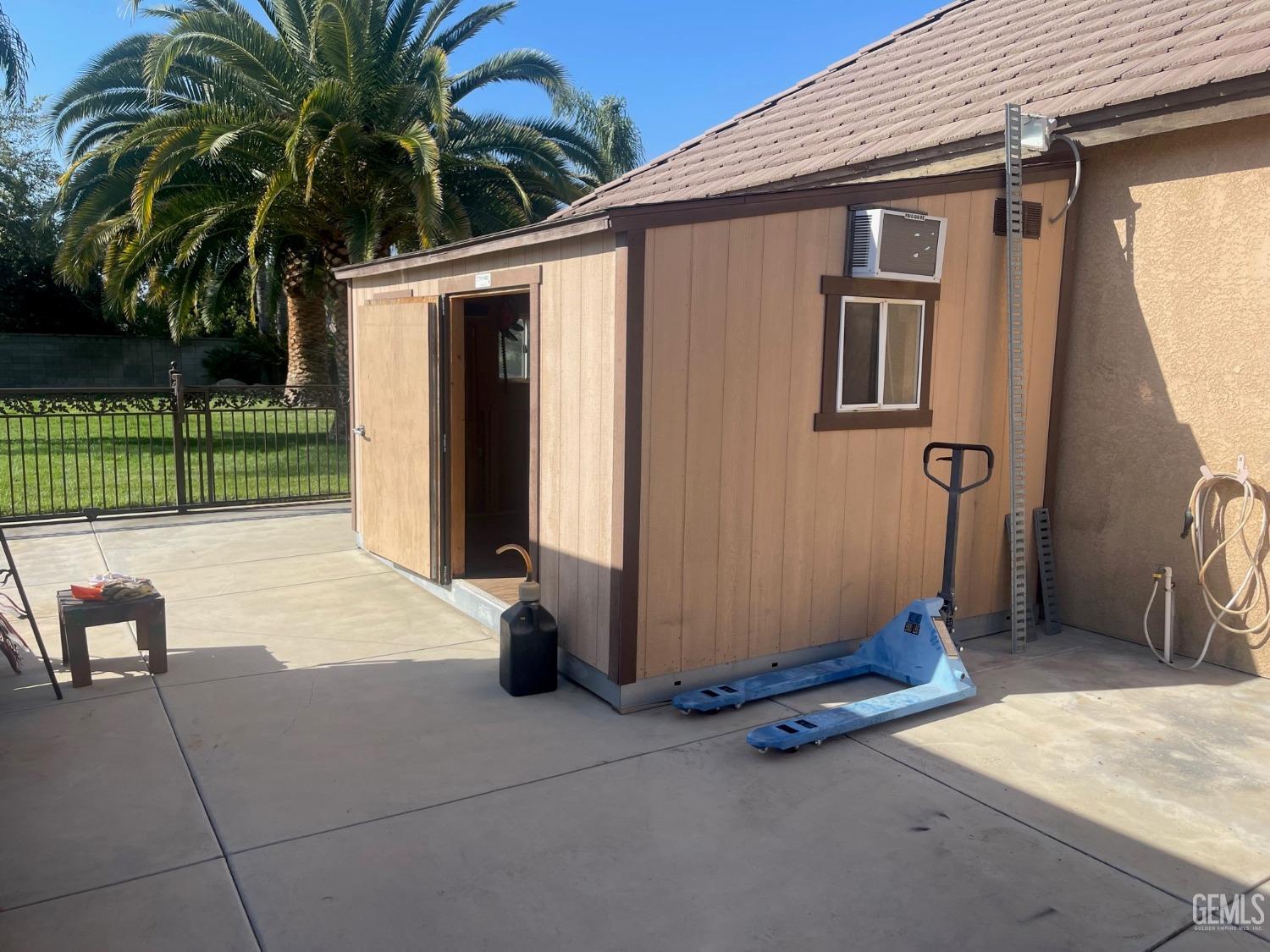 Undisclosed Address Bakersfield, CA 93314 - Photo 27 of 60 a backyard of a house with seating space