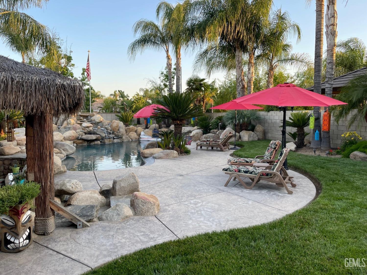 Undisclosed Address Bakersfield, CA 93314 - Photo 10 of 60 a view of a backyard with sitting area and furniture