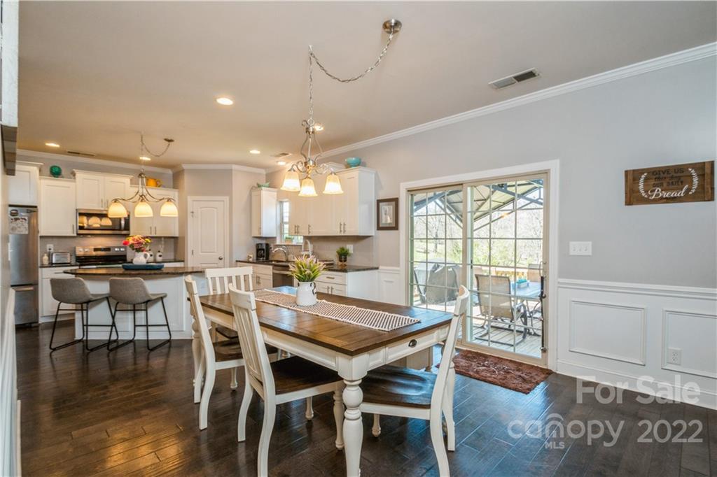 5113 Unionville Road Monroe, NC 28110 - Photo 17 of 43 a view of a dining room with furniture window and wooden floor