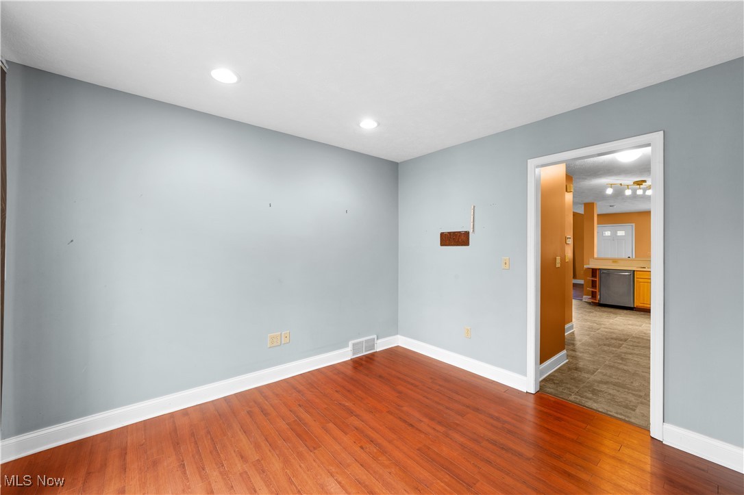 1802 Spring Road Cleveland, OH 44109 - Photo 12 of 40 Spare room featuring hardwood / wood-style floors