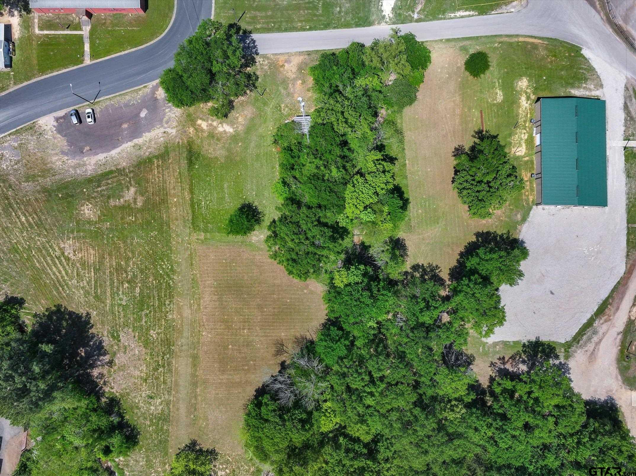 300 Quail Street Van, TX 75790 - Photo 2 of 19 an aerial view of a house with a yard