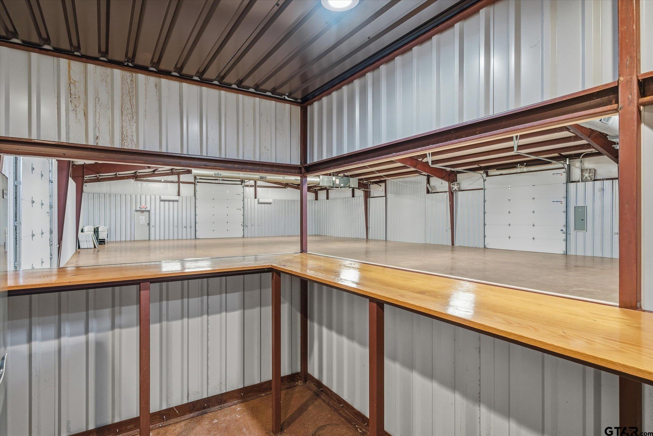 300 Quail Street Van, TX 75790 - Photo 7 of 19 a view of a kitchen with wooden floor and staircase