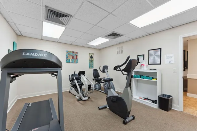 a view of a room with gym equipment