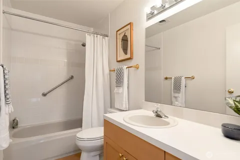 a bedroom with bed and window