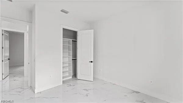 an empty room with closet