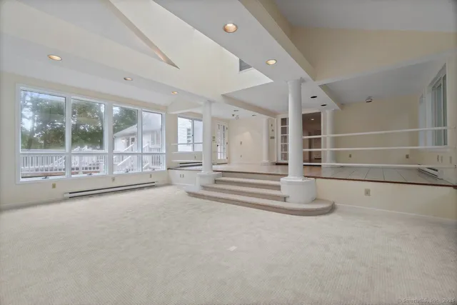 a view of a big room with large windows and large windows