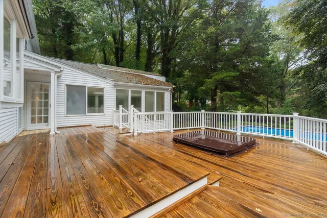 a view of a swimming pool with a patio