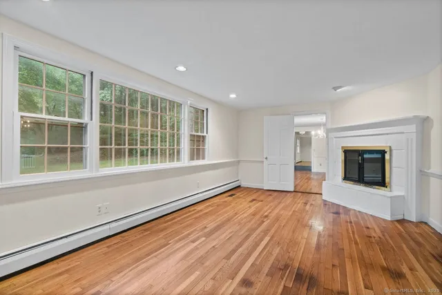 a view of a kitchen with a sink and a stove top oven