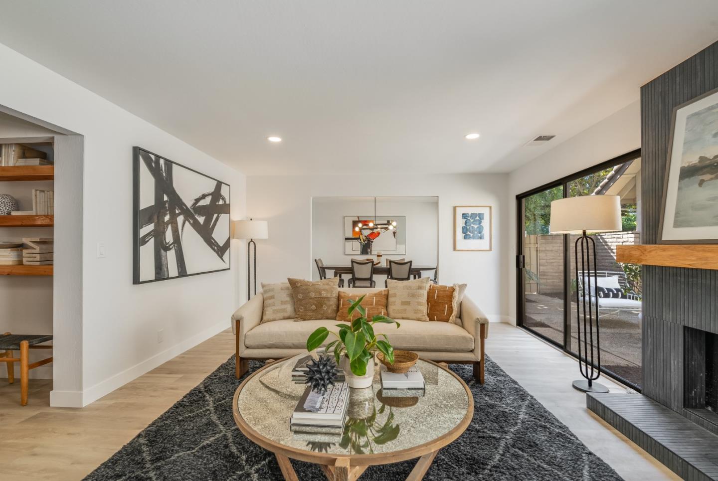 1903 Milano Way Mountain View, CA 94040 - Photo 15 of 48 a living room with furniture a dining table and a chandelier
