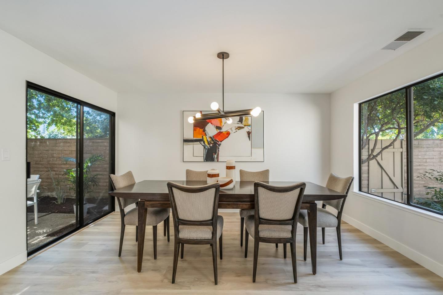 1903 Milano Way Mountain View, CA 94040 - Photo 16 of 48 a view of a dining room with furniture window and outside view