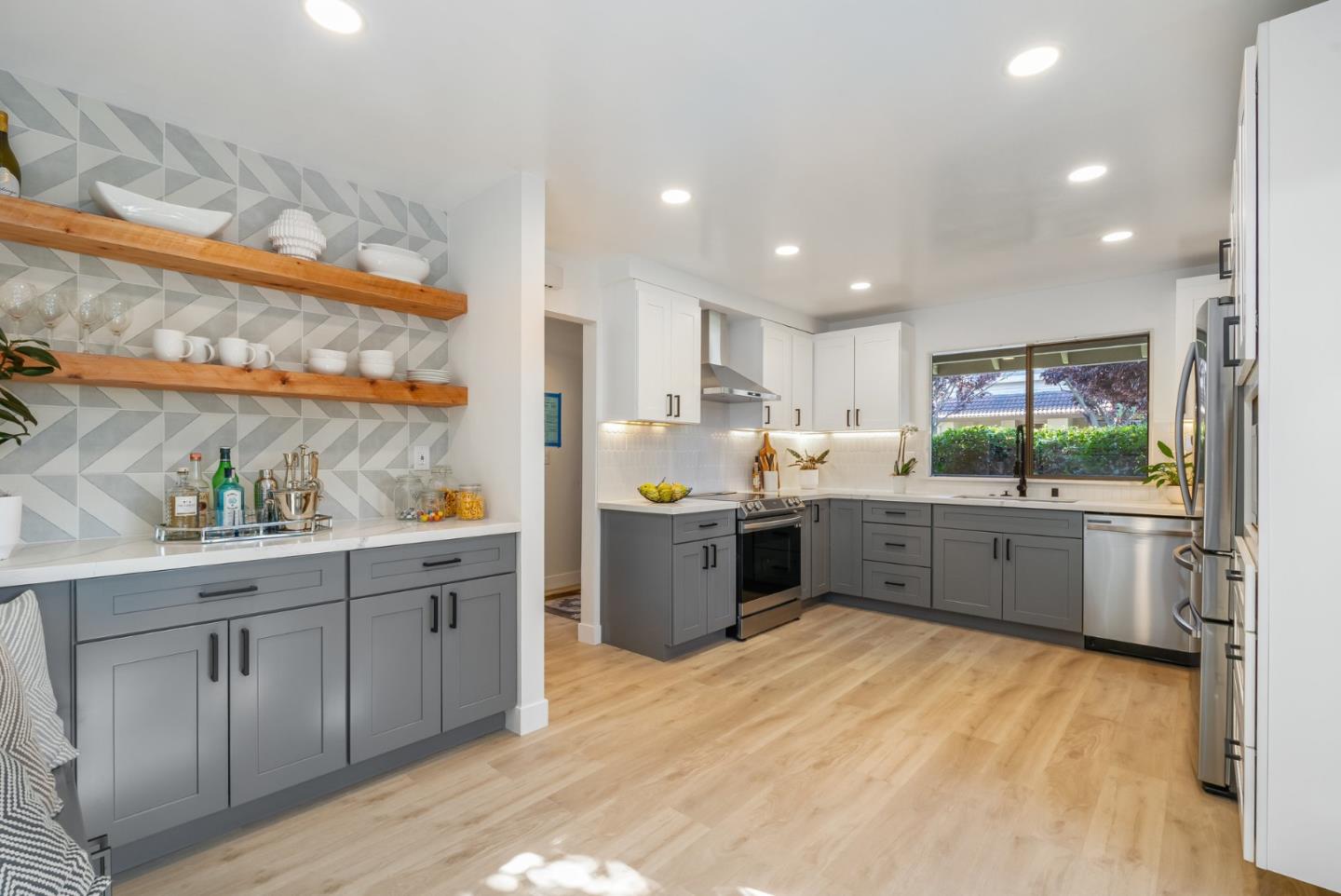 1903 Milano Way Mountain View, CA 94040 - Photo 20 of 48 a kitchen with stainless steel appliances a sink counter top space and cabinets