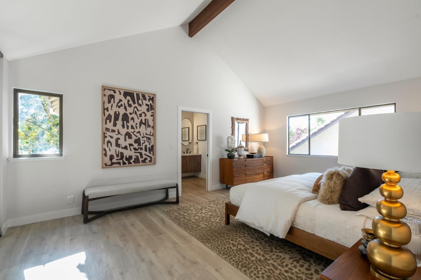 1903 Milano Way Mountain View, CA 94040 - Photo 26 of 48 a spacious bedroom with a bed and wooden floor