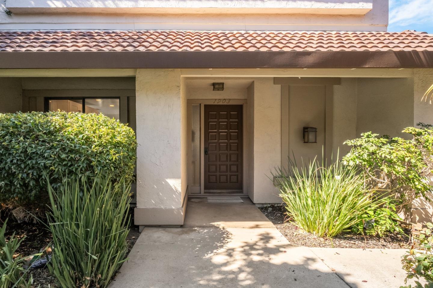 1903 Milano Way Mountain View, CA 94040 - Photo 5 of 48 a view of a entryway door of the house