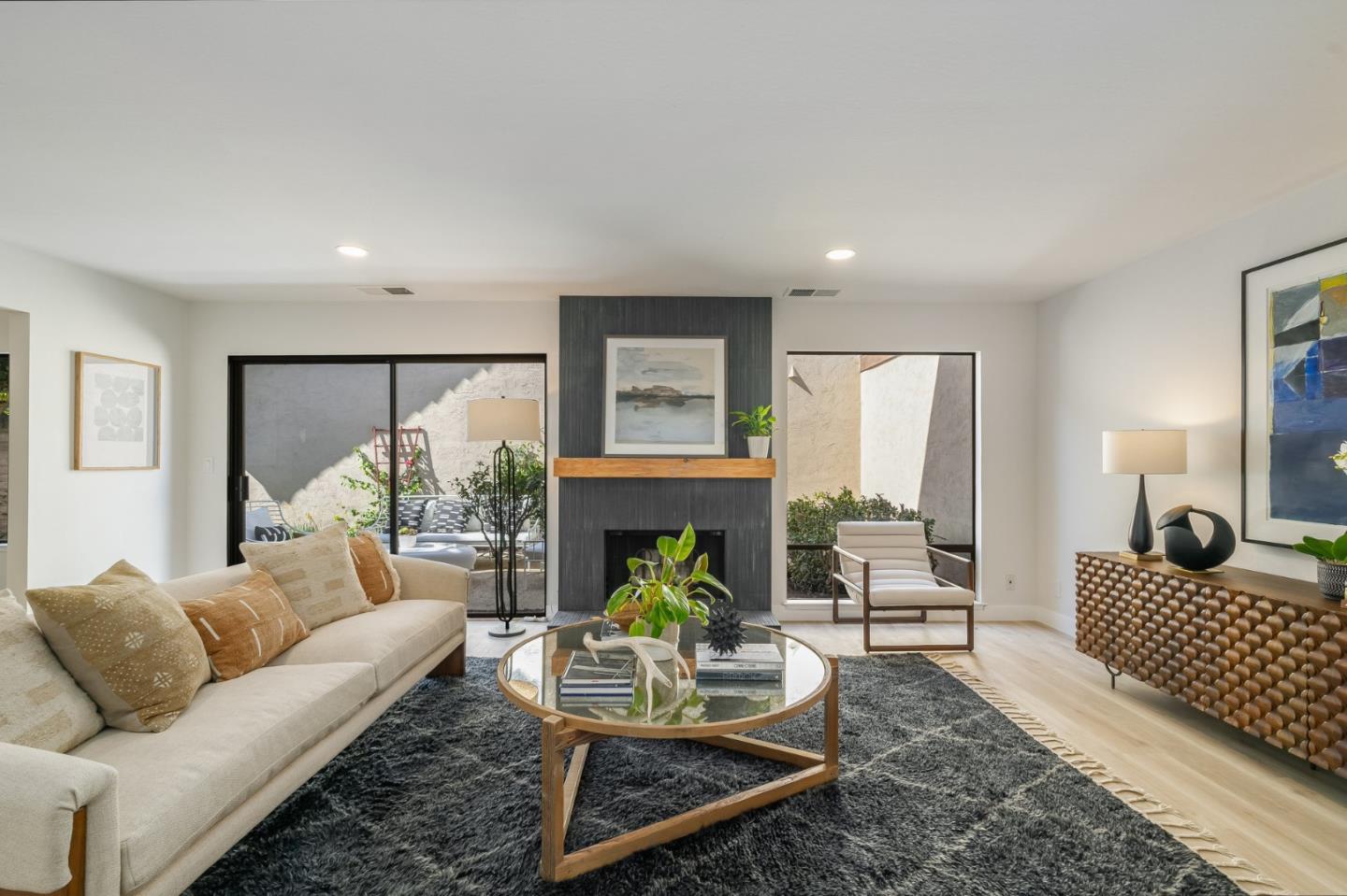 1903 Milano Way Mountain View, CA 94040 - Photo 8 of 48 a living room with furniture fireplace and a large window