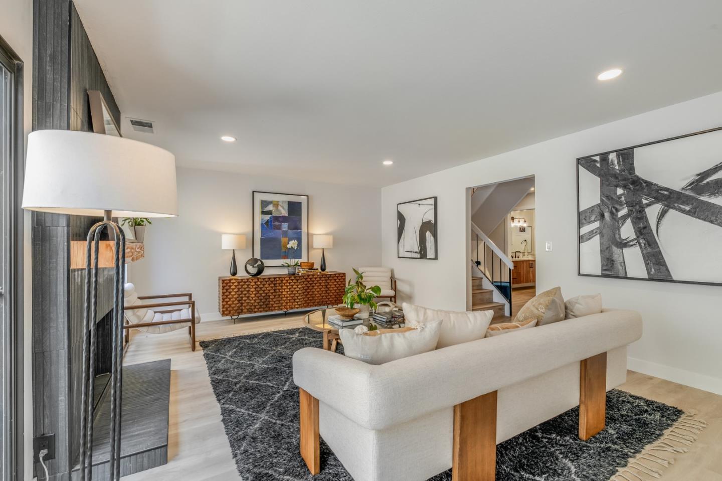 1903 Milano Way Mountain View, CA 94040 - Photo 10 of 48 a living room with furniture and a lamp
