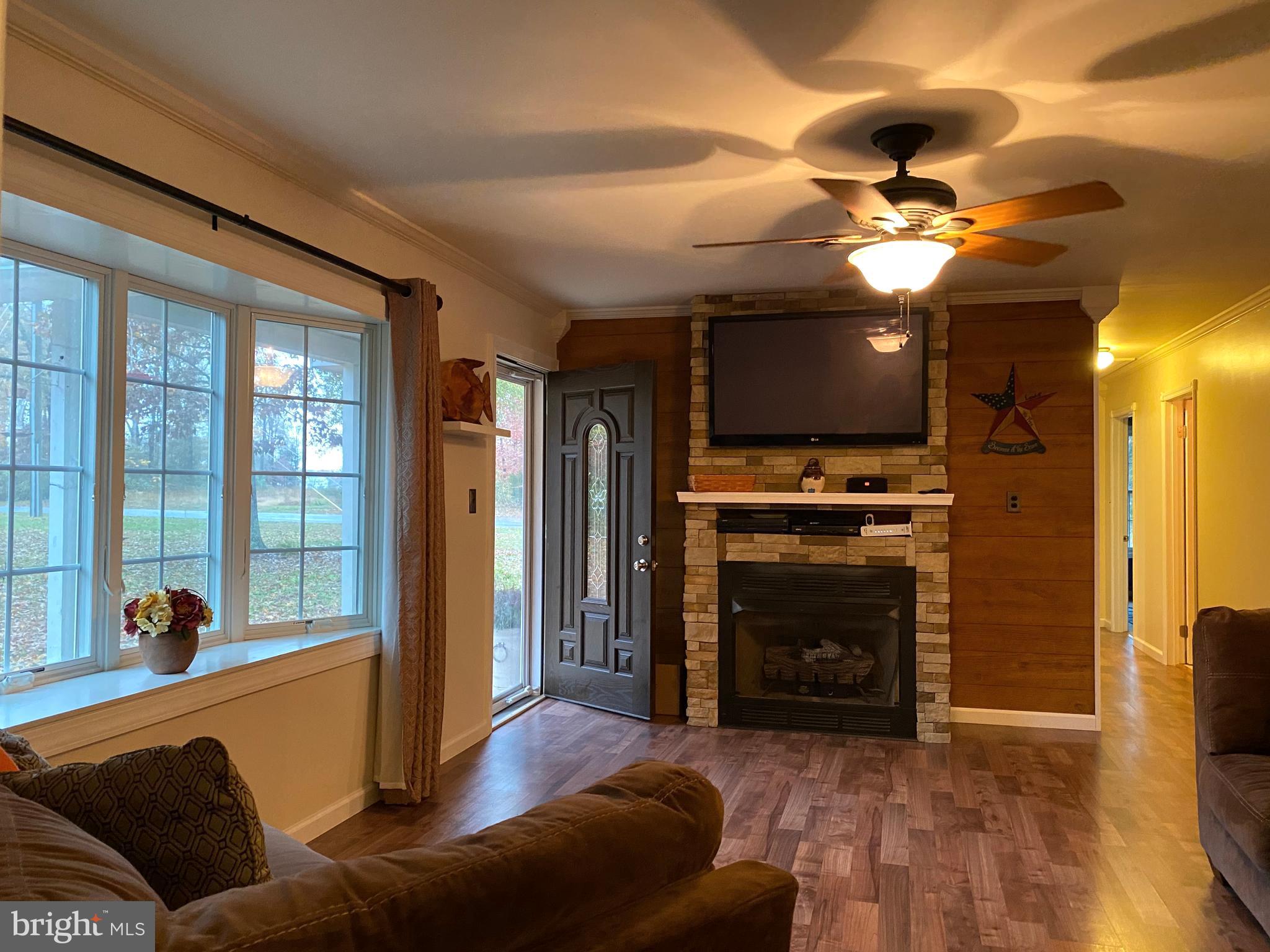 8661 Mitchell Road Denton, MD 21629 - Photo 10 of 30 Stack stone fireplace