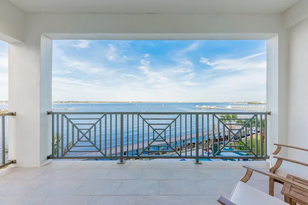 a view of balcony with wooden floor