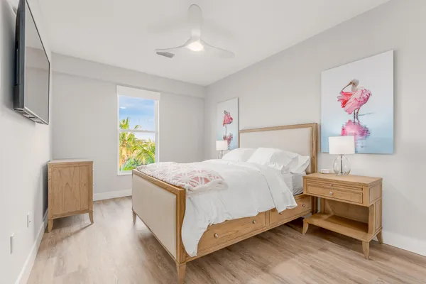 a bed room with a bed and a table