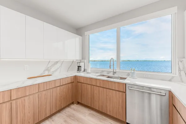 a kitchen with a sink and a window