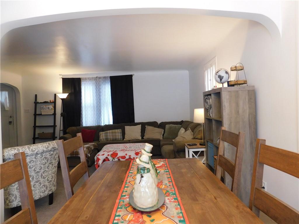 1687 Rte 481 Charleroi, PA 15022 - Photo 12 of 30 a living room with furniture and a fireplace