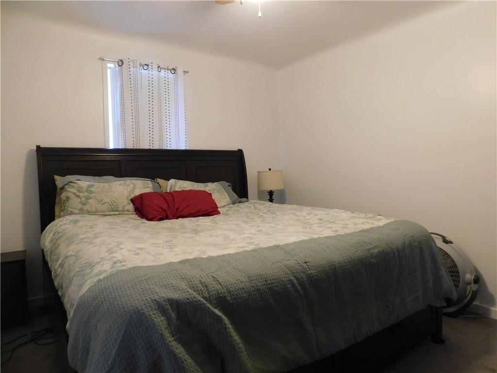 1687 Rte 481 Charleroi, PA 15022 - Photo 21 of 30 a bedroom with a bed and a window