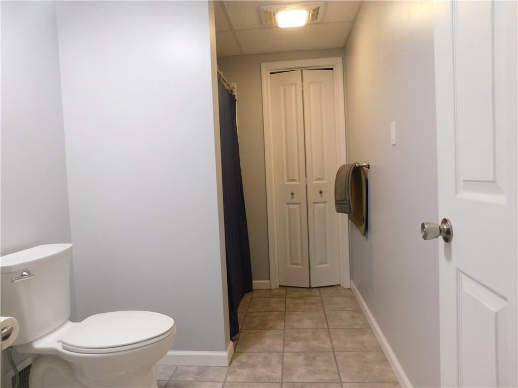 1687 Rte 481 Charleroi, PA 15022 - Photo 25 of 30 a bathroom with a toilet and a shower