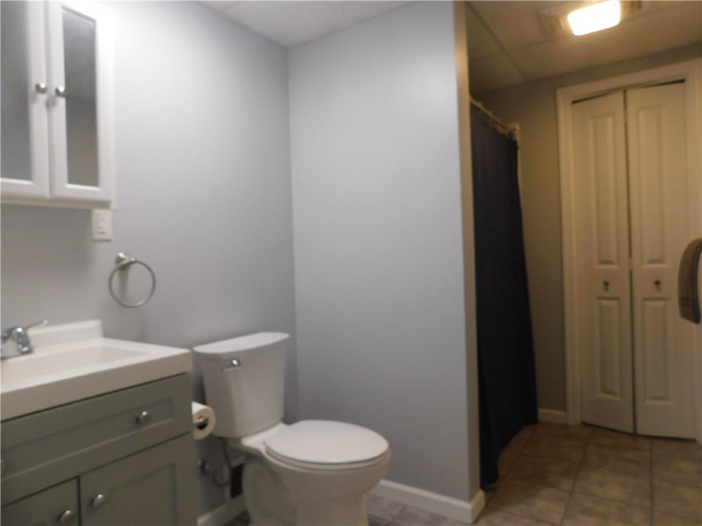 1687 Rte 481 Charleroi, PA 15022 - Photo 26 of 30 a bathroom with a toilet sink and a mirror