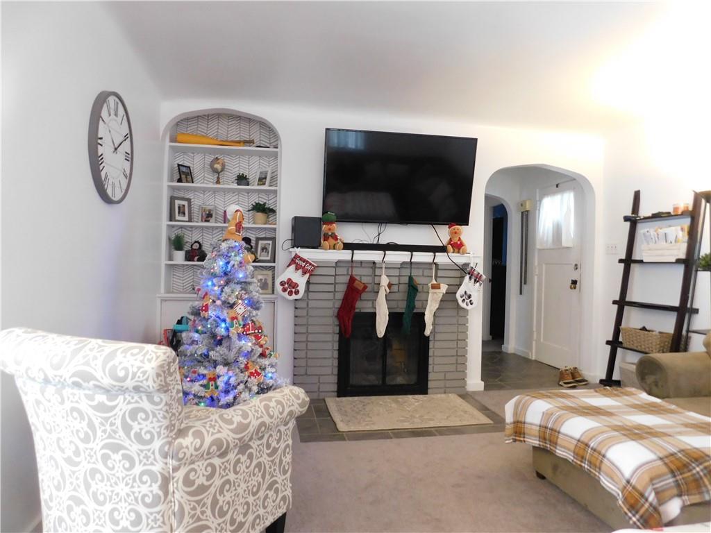 1687 Rte 481 Charleroi, PA 15022 - Photo 8 of 30 a bed room with a bed and a flat screen tv