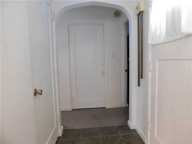 a view of a closet from a hallway